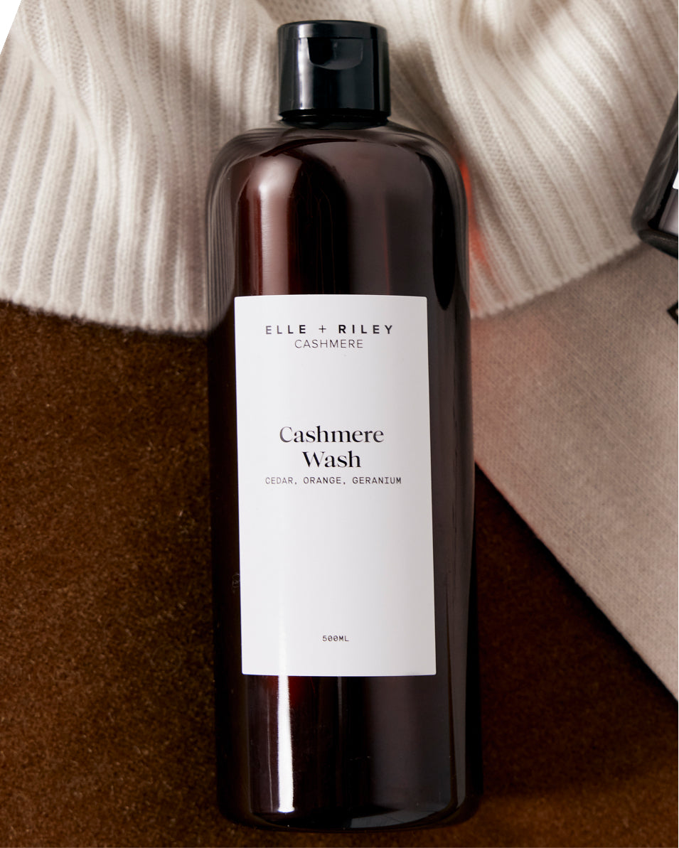 02. Fill up a basin or wash bucket with cold water and pour in one capful of Elle & Riley Cashmere Wash.