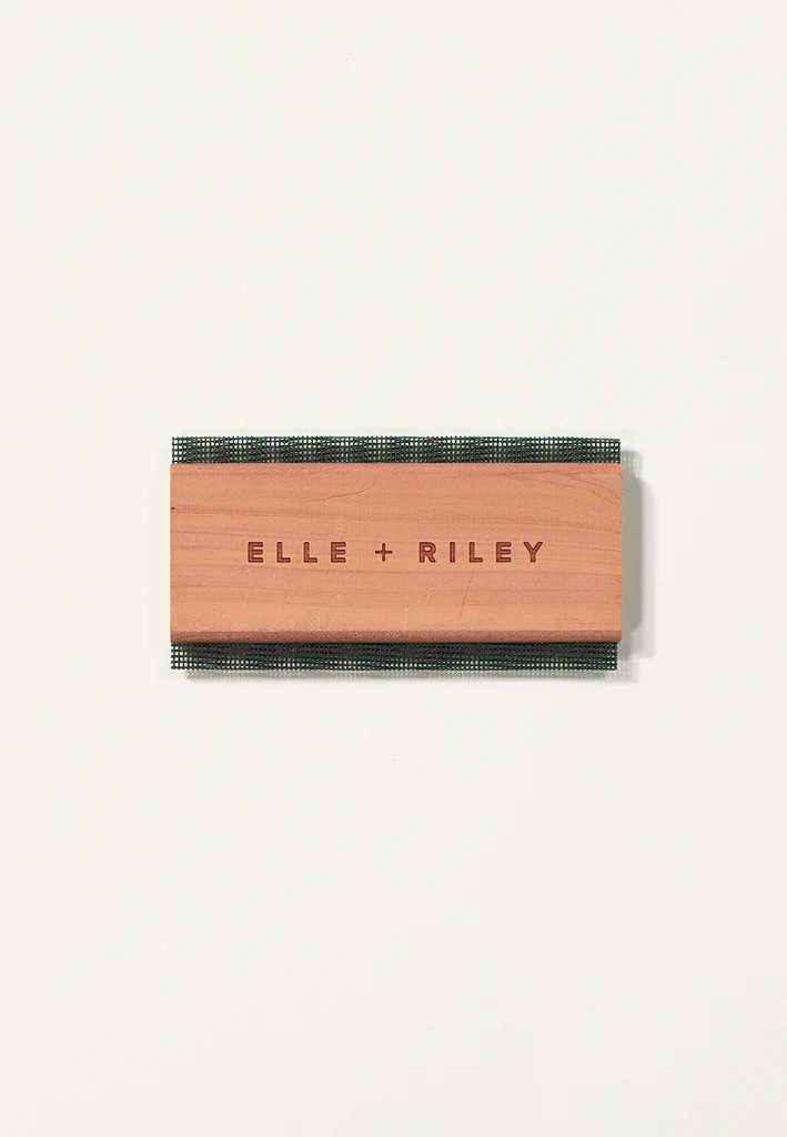 01. Gently remove any pilling particles with your Elle & Riley Cashmere Comb.